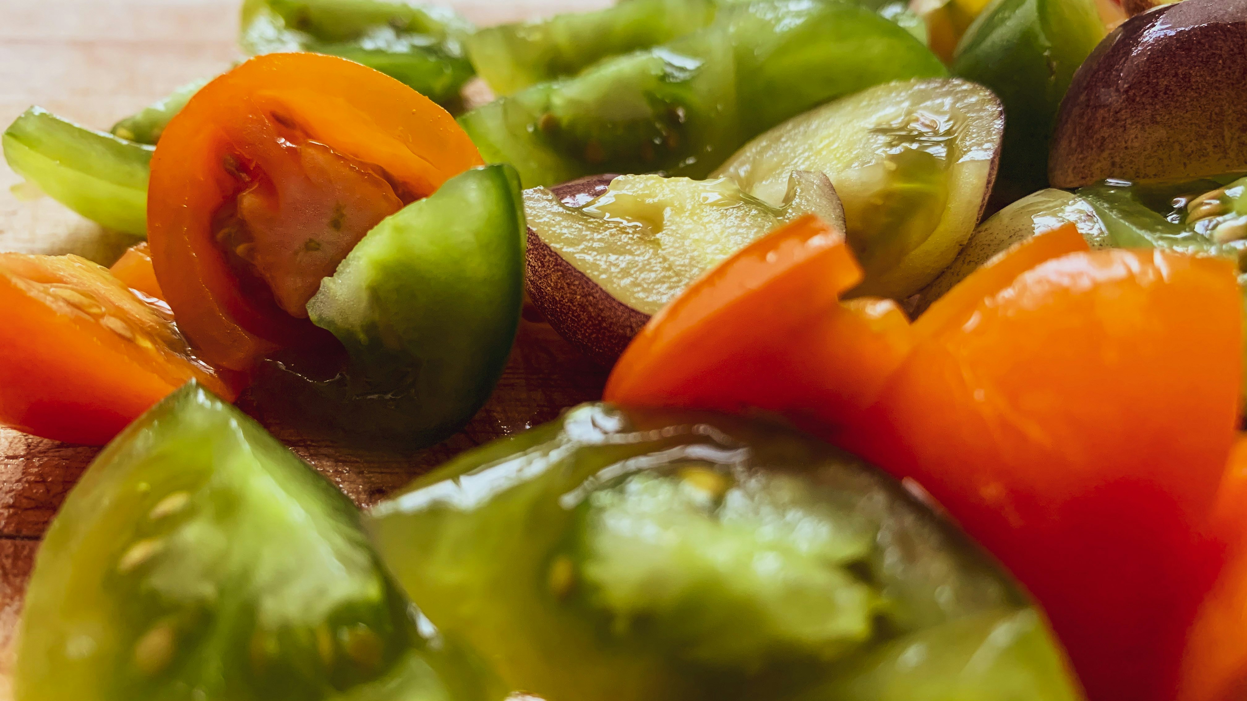 sliced tomato and green vegetable